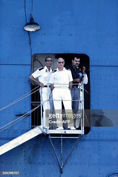 Gerardo di Rossa , the captain of Italian cruise liner Achille Lauro watches the press, on October 10 from the gangway of the ship at the end of a...