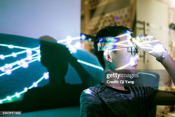 male meditating at night - glasfaser stock-fotos und bilder