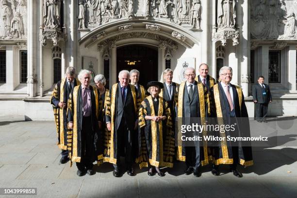Judges of the Supreme Court including the newly appointed Lady Justice Arden and Lord Justice Kitchin pose outside the court building ahead of the...