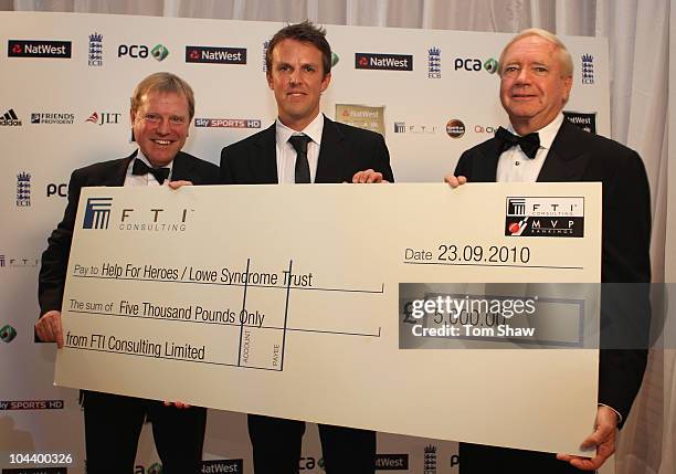 Graeme Swann of England poses with the FTI England Player of the Summer Award during PCA Awards dinner at the Hurlingham Club on September 23, 2010...