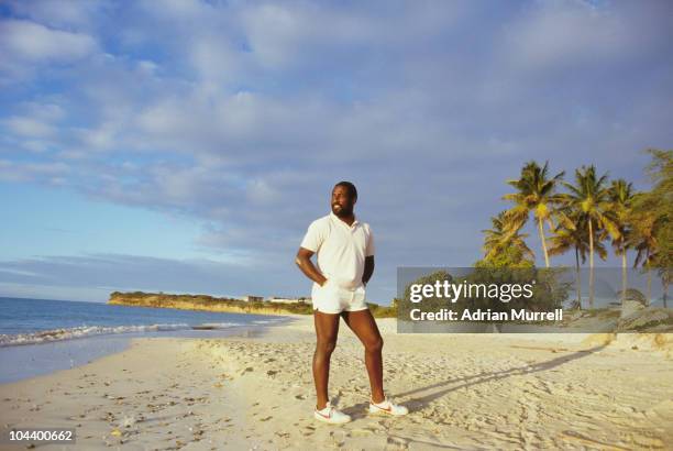 West Indian cricketer Viv Richards during the England Test tour of the West Indies walks on the beach in Antigua on 30th March 1986 in Antigua and...