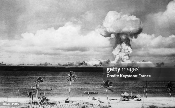 The American army exploded a nuclear bomb above BIKINI atoll off the MARSHALL islands in the Pacific. A mushroom of smoke rises above the island...