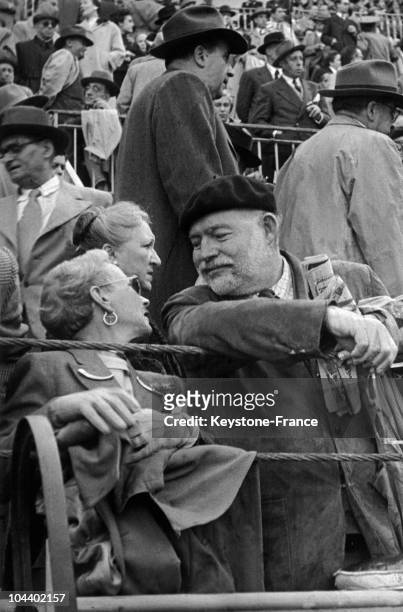 Ernest HEMINGWAY and his wife Mary WELSH attending a bullfight in Madrid.