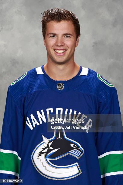 Ben Hutton of the Vancouver Canucks poses for his official headshot for the 2018-2019 season on September 13, 2018 at Rogers Arena in Vancouver,...