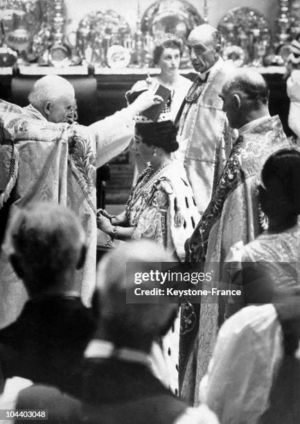 Following the coronation of George VI, King of England, the coronation of Queen Elizabeth by the archbishop of Canterbury in Westminster Abbey. This...