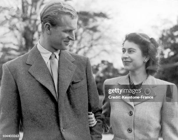 Princess ELIZABETH and the Duke of EDINBURGH make a charming picture when they specially posed for the camera at Broadlands, Romsey, where they are...