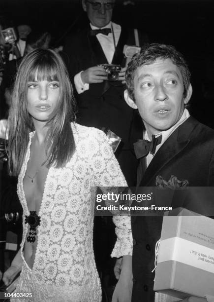 Serge GAINSBOURG and Jane BIRKIN arriving at the Artists Union's Gala, Paris.