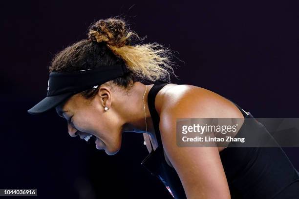 Naomi Osaka of Japan reacts against Zarina Diyas of Kazakhstan during their Woen's Singles 1nd Round match of the 2018 China Open at the China...