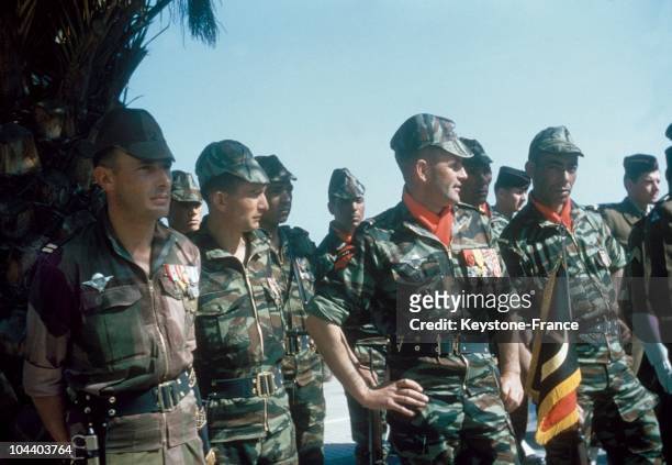 The leaders of the commandos, formed by Colonel BIGEARD at Saida to track the NLF's commandos, came to pay honors to General CHALLE who is being...