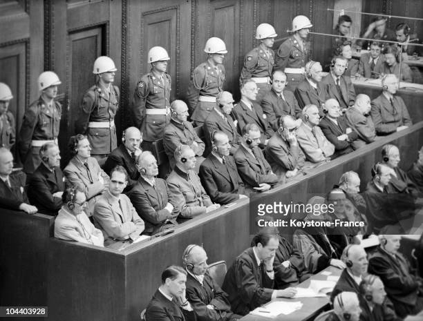 General view in 1946 or 1947 of Nazi war criminals in the dock during the Nuremberg trials: from left to right, first row, Hermann GÖRING, Rudolf...