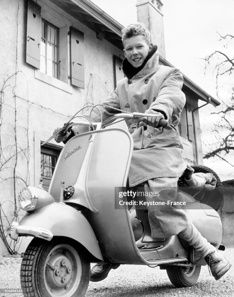Vittorio-Emanuele On A Motorbike In Switzerland In 1951