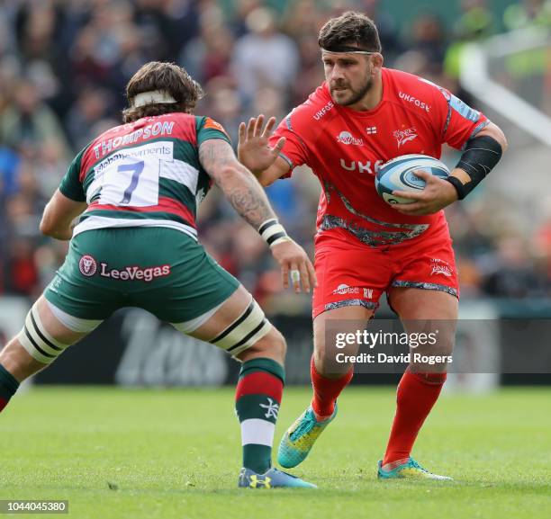 Rob Webber of Sale Sharks takes on Guy Thompson during the Gallagher Premiership Rugby match between Leicester Tigers and Sale Sharks at Welford Road...