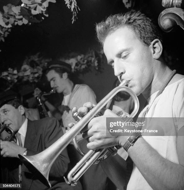 The French writer and poet Boris VIAN playing his favorite music, jazz on the trumpet, at the Saint-Germain Club in Paris.