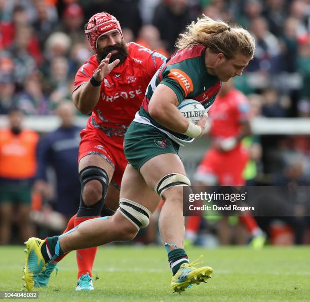 David Denton of Leicester Tigers is tackled by Josh Strauss during the Gallagher Premiership Rugby match between Leicester Tigers and Sale Sharks at...