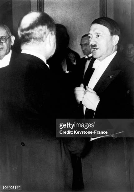 The German Chancellor Adolf HITLER speaking with the French ambassador Francois PONCET, in Berlin on February 19, 1936. At the occasion of the Auto...