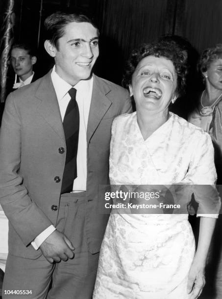 Edith PIAF and Marcel Cerdan's son, aged 15 during a party at Maxim's.