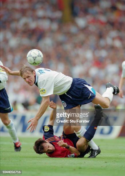 England fullback Stuart Pearce rides a tackle during the 1996 UEFA Euro 96' quarter final match against Spain at Wembley Stadium on June 22, 1996 in...