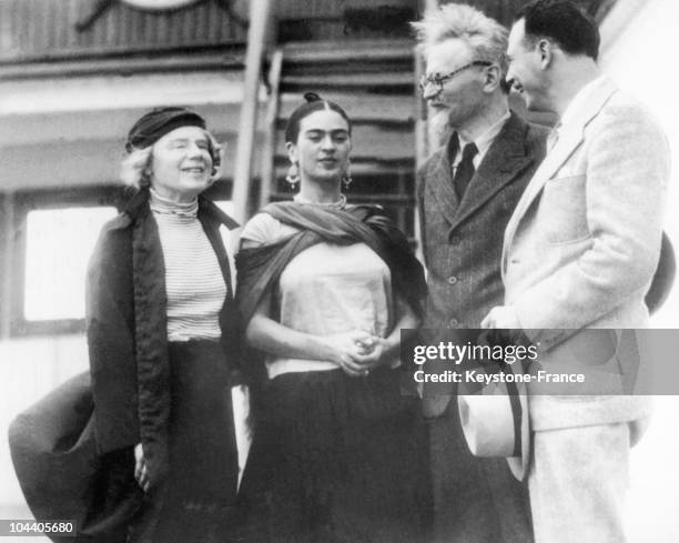 Russian Marxist revolutionary Leon Trotsky and his second wife, Natalia Sedova , are greeted by Mexican painter Frida Kahlo and Polish-born American...