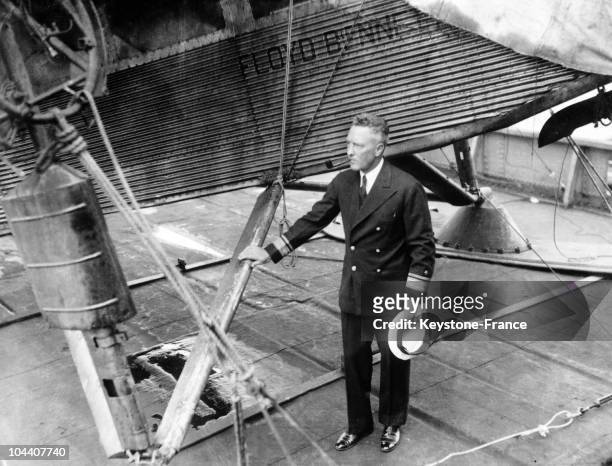 The American admiral Richard Evelyn BYRD posing next to the three-engine FORD which he used on his expedition to the South Pole.