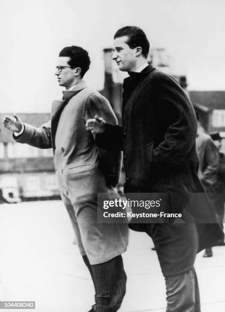 On February 27 brothers BAUDOUIN 1st and ALBERT II of Belgium waving goodbye to their father, ex-King LEOPOLD III, and the Princess of RETHY as they...