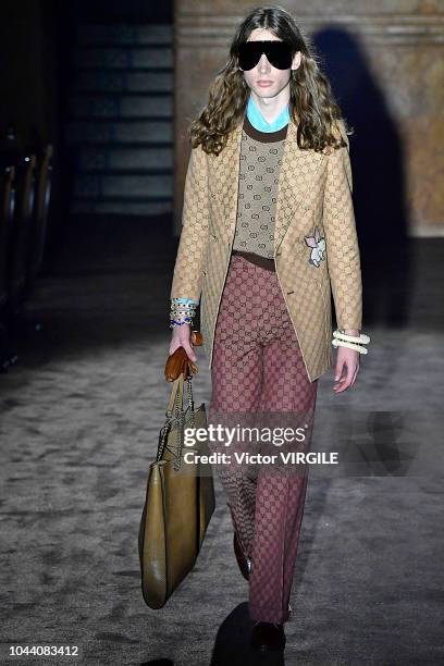 Model walks the runway at the Gucci Ready to Wear fashion show during Paris Fashion Week Spring/Summer 2019 on September 24, 2018 in Paris, France.