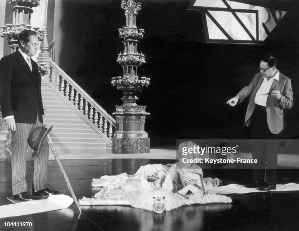 The American director Joseph Mankiewicz directs actors Rex Harrison and Edie Adams in a scene from Honey Pot, in October 1965.