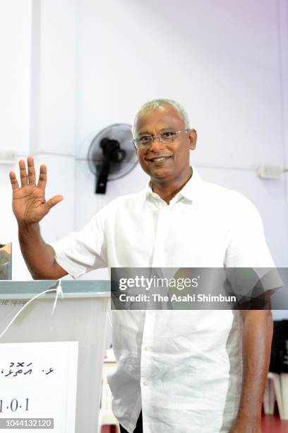 Opposition Maldivian Democratic Party presidential candidate Ibrahim Mohamed Solih waves after casting his ballot in the presidential election at a...