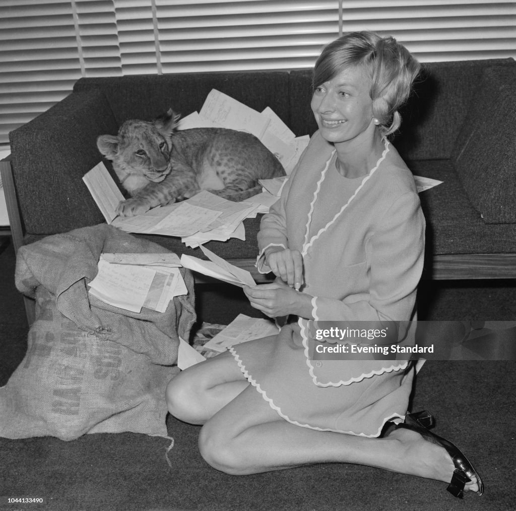 British BBC's Blue Peter editor Biddy Baxter reading letters from