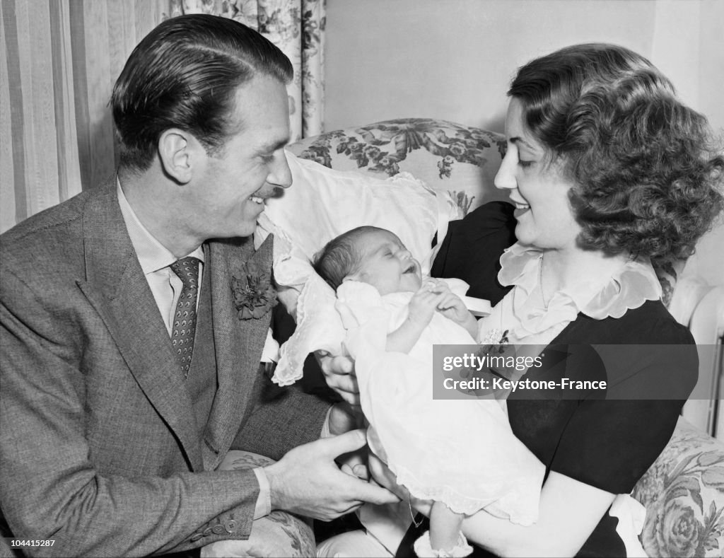 Douglas Fairbanks Junior And His Wife Mary Lee Eppling Hartford With Their Baby Daughter Daphne As They Prepared To Leave The Good Samaritan Hospital For Their Home In Pacific Palisades On April The 24Th 1940.