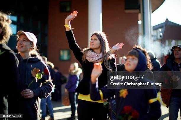 Anti-fracking protesters stand outside Preston Crown Court and wave to Rich Loizou, Richard Roberts and Simon Roscoe-Blevins who are awaiting...