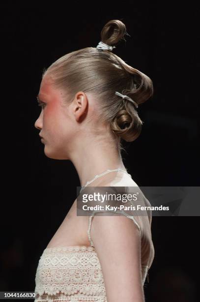Model walks the runway during the Valentin Yudashkin show as part of the Paris Fashion Week Womenswear Spring/Summer 2019 on October 1, 2018 in...
