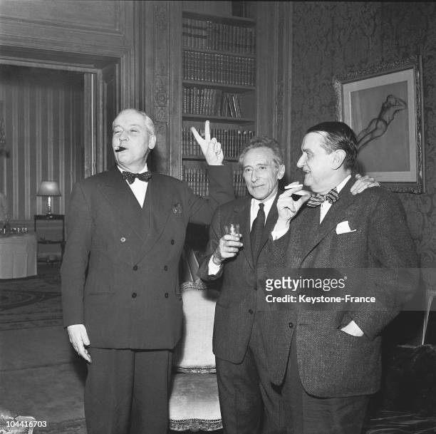 On March 4 after Jean COCTEAU was elected to the Academie Francaise, the Paris police prefect Andre Louis DUBOIS pictured with Jean COCTEAU and...