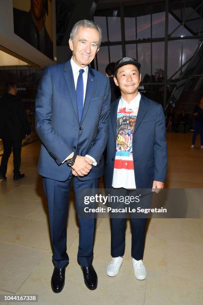 Bernard Arnault and Yusaku Maezawa attend the Opening Of The New Exhibitions Jean-Michel Basquiat And Egon Schiele At The Fondation Louis Vuitton at...