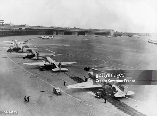 Air Force unloading at Tempelhof airfield in Berlin, their cargoes of food and other supplies for the inhabitants of Berlin, isolated by the embargo...