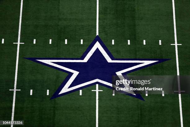 The Dallas Cowboys logo at AT&T Stadium on September 30, 2018 in Arlington, Texas.