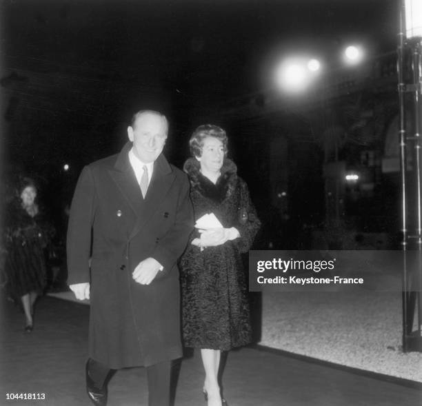 And his wife Jeanne LEFRIQUE going to the reception of arts and literature at the Elysee on December 11, 1967.