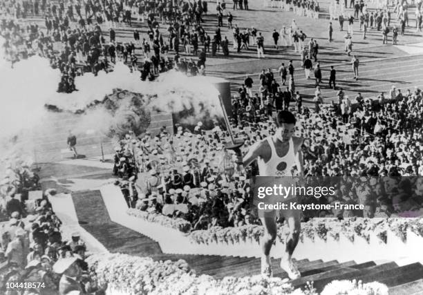 Japanese Student Yoshinori Sakai Holding The Olympic Flame For The Opening Ceremony Of The Olympic Games Of Tokyo On October 11, 1964. The Ceremony...