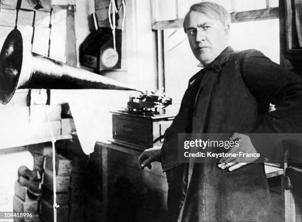 American inventor and businessman Thomas Edison with an Edison Standard Phonograph, at his lab in West Orange, New Jersey, 1906. The Edison Standard...