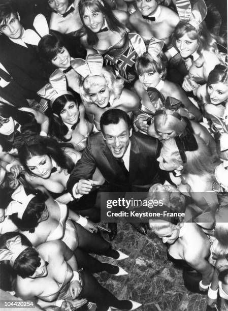 Hugh Hefner, The Director Of The Play-Boy Newspaper And Club, Pictured Surrounded By 50 Bunnies On June 27, 1966. They Were To Work At His New Club...