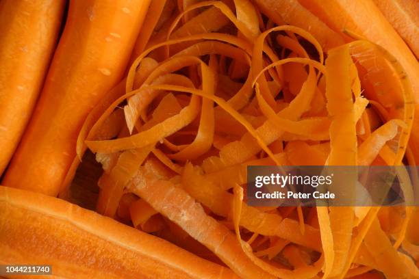 carrots and peelings - vitamin a stock pictures, royalty-free photos & images