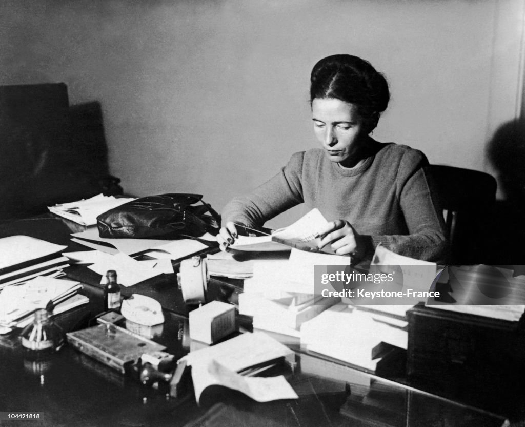 Simone De Beauvoir Reading At Her Desk In 1953