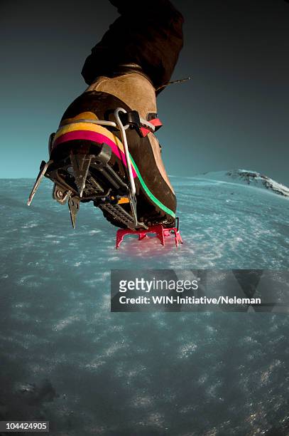 leg of a climber on snow, mt elbrus, caucasus, russia - crampon stock pictures, royalty-free photos & images