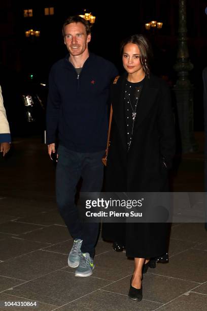 Alicia Vikander and Michael Fassbender arrive at their hotel on October 1, 2018 in Paris, France.