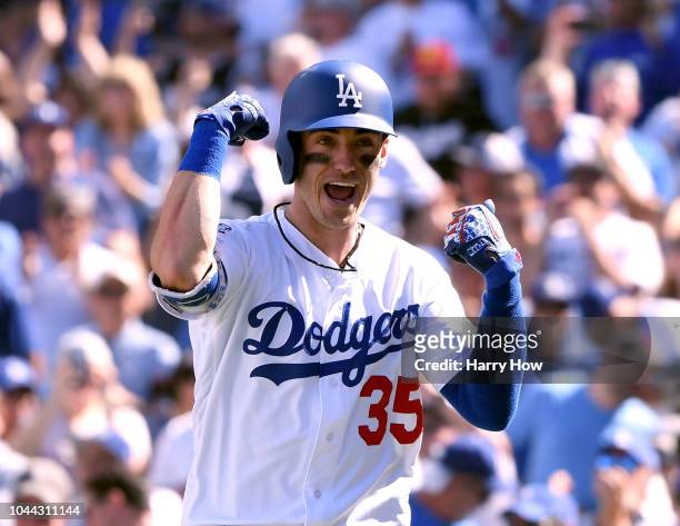 Cody Bellinger of the Los Angeles Dodgers reacts after his two run homerun to take a 2-0 lead in the fourth inning against the Colorado Rockies...