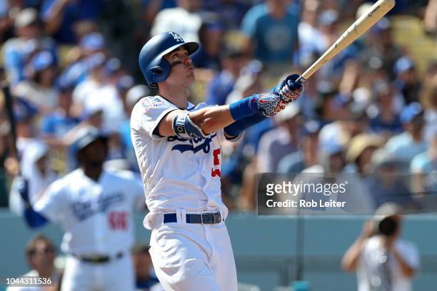 Cody Bellinger of the Los Angeles Dodgers hits a two-run home run during the fourth inning against the Colorado Rockies at Dodger Stadium on Monday,...