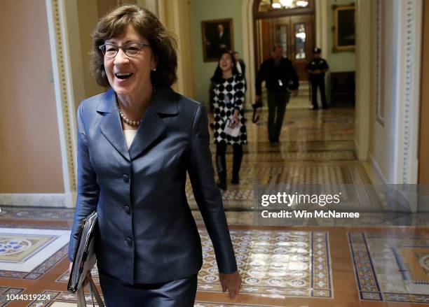 Sen. Susan Collins walks outside the office of Senate Majority Leader Mitch McConnell September 25, 2018 in Washington, DC. Supreme Court nominee...