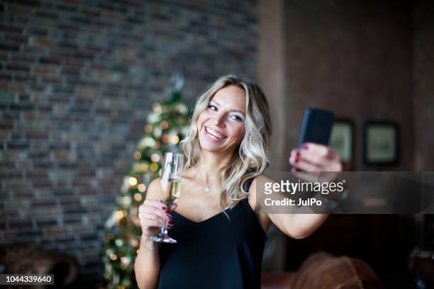 new year’s eve celebrations - christmas party dress stock pictures, royalty-free photos & images
