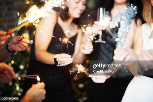 new year's eve viering - christmas party dress stockfoto's en -beelden