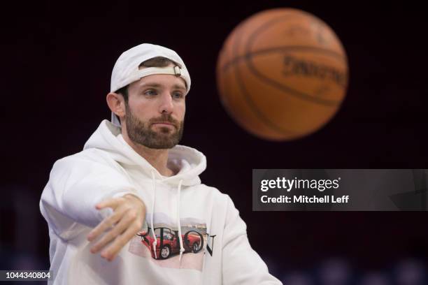 Shooting coach and CEO of Pure Sweat, Drew Hanlen, tosses a basketball prior to the preseason game between the Orlando Magic and Philadelphia 76ers...