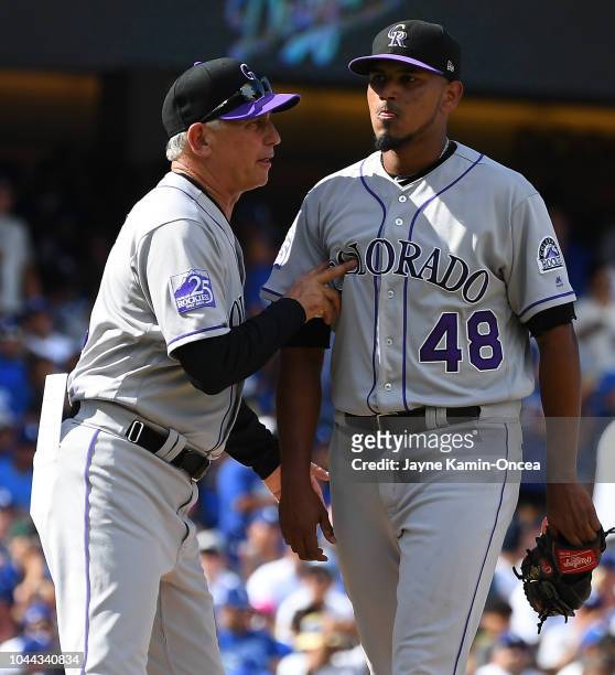 Manager Bud Black pulls starting pitcher German Marquez of the Colorado Rockies in the sixth inning of the game against the Los Angeles Dodgers at...